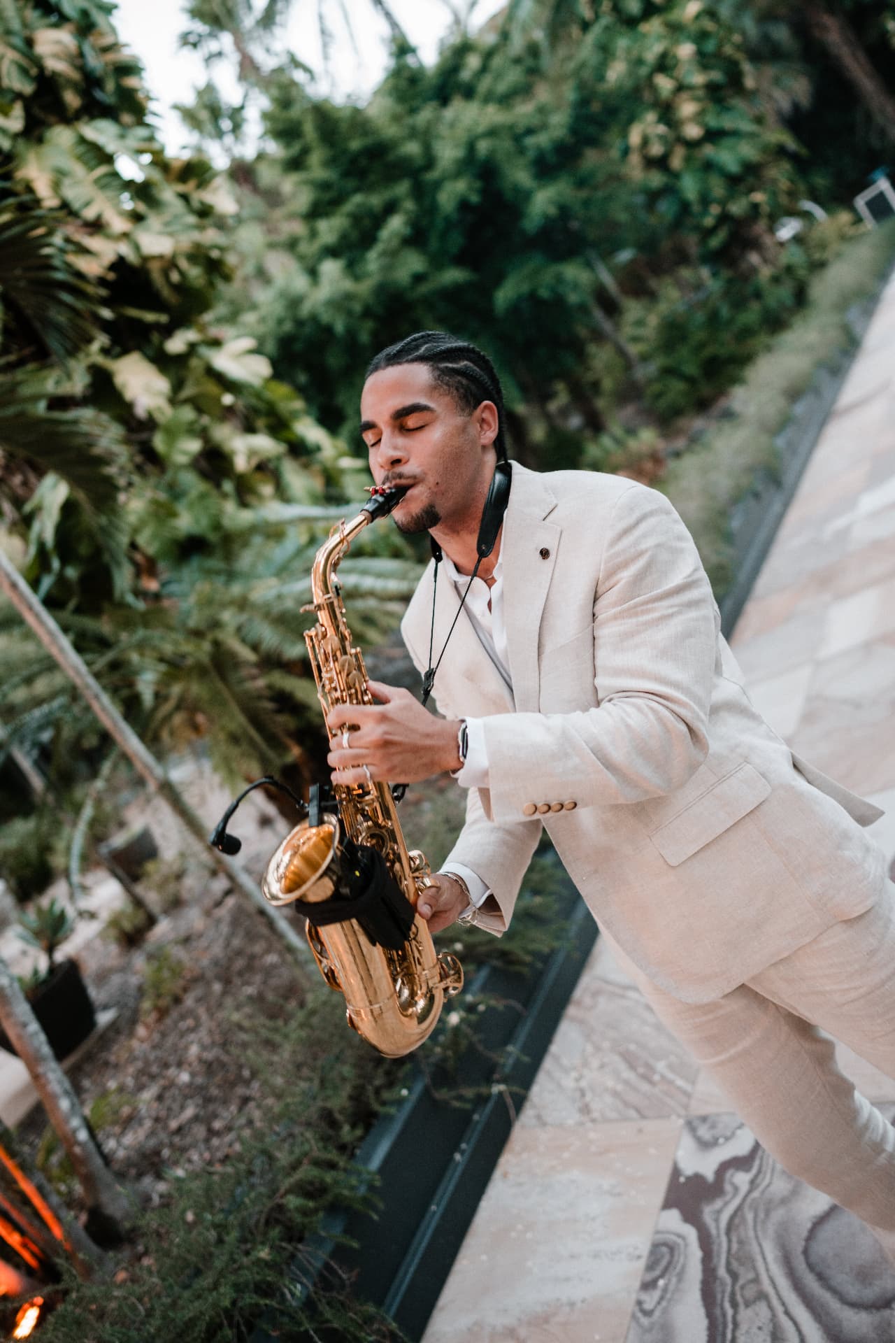 Portrait of Jame Prendergast with his saxophone